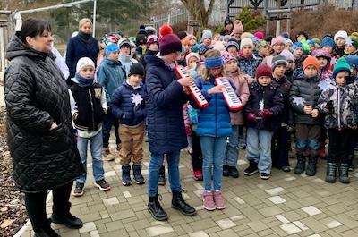 Vánoční zpívání na zahrádce s punčem